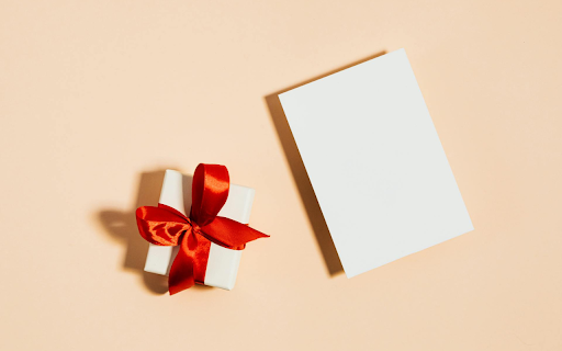 White card and red bow gift box  from Chrome web store to be run with OffiDocs Chromium online