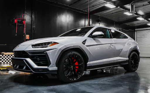 White Lamborghini Urus Theme: Power, Luxury, and Prestige  from Chrome web store to be run with OffiDocs Chromium online