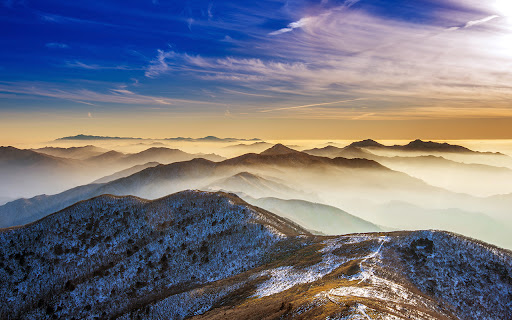 winter landscape with sunset and fog in the Deogyusan Mountains  from Chrome web store to be run with OffiDocs Chromium online