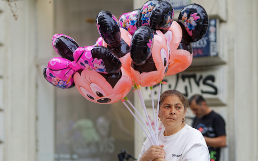 Woman holding ball  from Chrome web store to be run with OffiDocs Chromium online