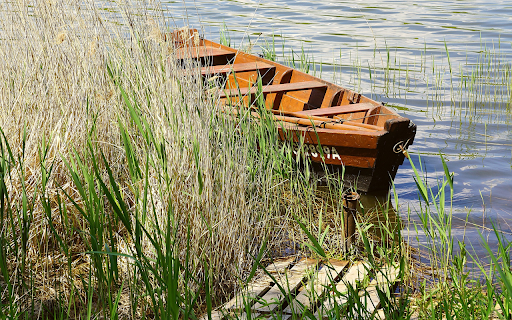 Wooden boat by the river  from Chrome web store to be run with OffiDocs Chromium online
