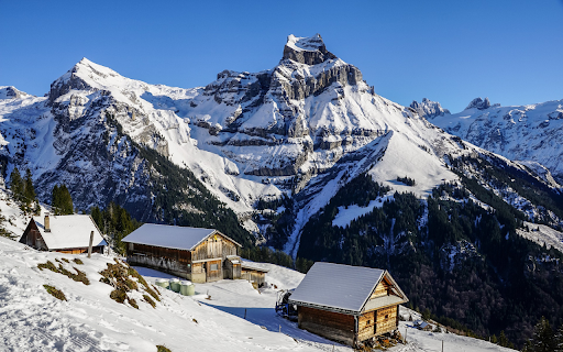 Wooden house in the snowy mountains  from Chrome web store to be run with OffiDocs Chromium online