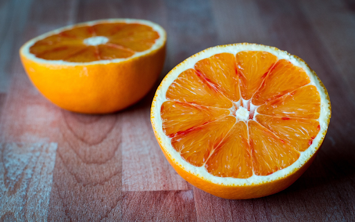 Yellow oranges cut in half  from Chrome web store to be run with OffiDocs Chromium online