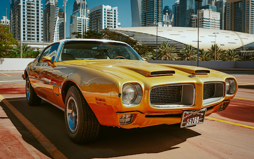Yellow Pontiac Car Parked on Parking Lot  from Chrome web store to be run with OffiDocs Chromium online