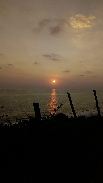Free download Sea Beach Sunset On The -  free photo or picture to be edited with GIMP online image editor