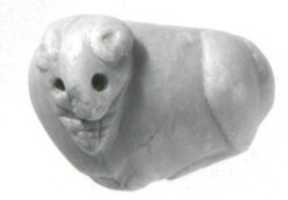 Free download Seal amulet in the form of a reclining cow free photo or picture to be edited with GIMP online image editor