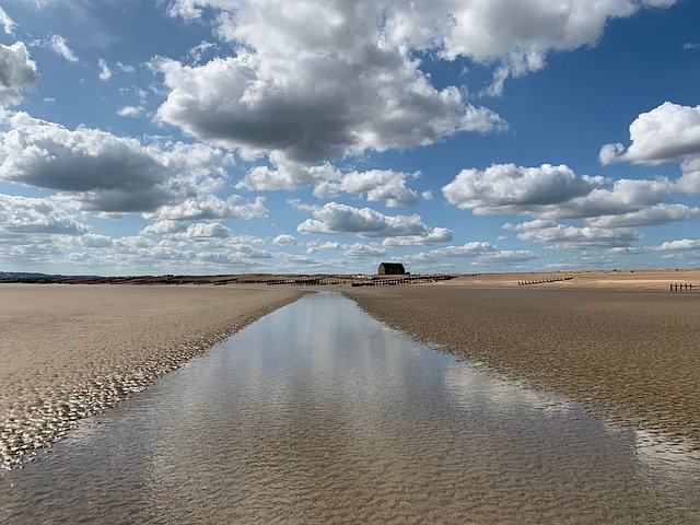 Безкоштовно завантажте Sea Sky Beach - безкоштовну фотографію чи зображення для редагування за допомогою онлайн-редактора зображень GIMP