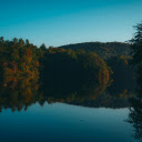 Serene Lake Landscape with Forest Reflections at Dawn  screen for extension Chrome web store in OffiDocs Chromium