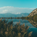 serene lake nestled among green trees  screen for extension Chrome web store in OffiDocs Chromium