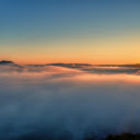 Serene Sunrise Above Foggy Wisconsin Hills  screen for extension Chrome web store in OffiDocs Chromium