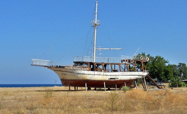 Free download Ship Shipwreck Sea -  free photo or picture to be edited with GIMP online image editor