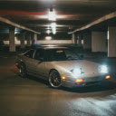 Silver Car Parked with Lights On  screen for extension Chrome web store in OffiDocs Chromium