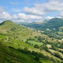 Small road through green grass hills  screen for extension Chrome web store in OffiDocs Chromium