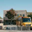 Small Town Street Scene with School Bus in Fall  screen for extension Chrome web store in OffiDocs Chromium