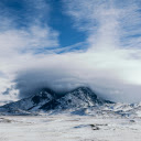 snow capped peak of Mount Mactiro shrouded in mist  screen for extension Chrome web store in OffiDocs Chromium