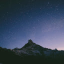Snowy mountain scene with stars at night  screen for extension Chrome web store in OffiDocs Chromium
