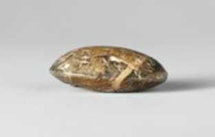 Free download Steatite intaglio: Lion-headed serpent free photo or picture to be edited with GIMP online image editor