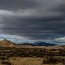 stunning landscape of mountains under a gray sky  screen for extension Chrome web store in OffiDocs Chromium