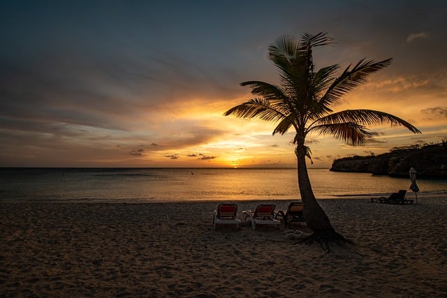 Bezpłatne pobieranie leżaków plażowych o zachodzie słońca na plaży za darmo do edycji za pomocą bezpłatnego edytora obrazów online GIMP