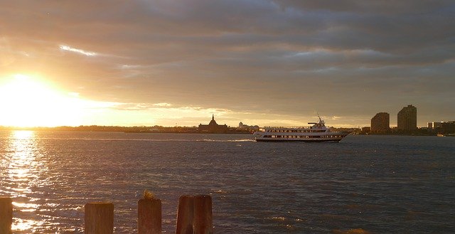 Free download Sunset Boat Newyork Stature -  free photo or picture to be edited with GIMP online image editor