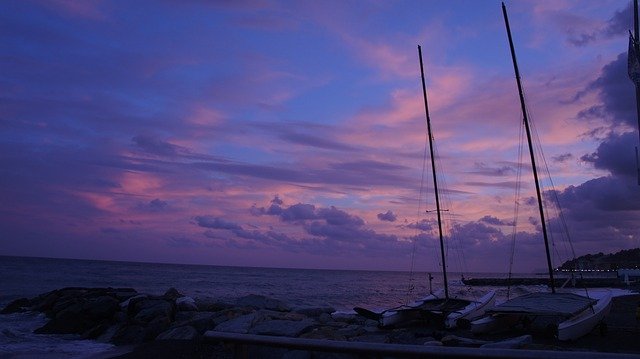 Descărcare gratuită Sunset Boats Sailboats - fotografie sau imagini gratuite pentru a fi editate cu editorul de imagini online GIMP