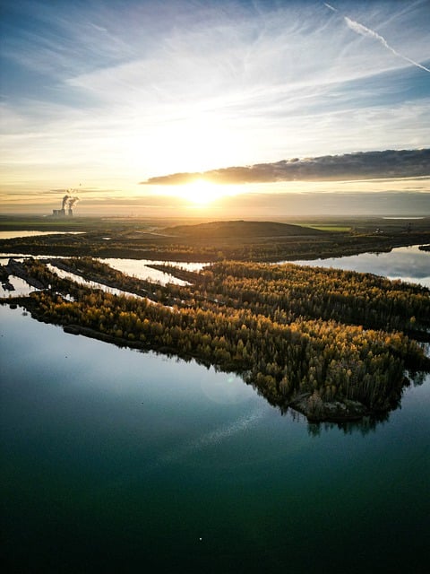 Bezpłatne pobieranie darmowego zdjęcia zachodzącego słońca nad rzeką w Lipsku, które można edytować za pomocą bezpłatnego edytora obrazów online GIMP