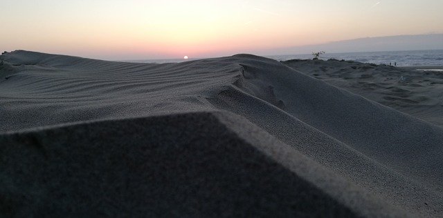 Bezpłatne pobieranie Sunset Sand Beach - bezpłatne zdjęcie lub obraz do edycji za pomocą internetowego edytora obrazów GIMP