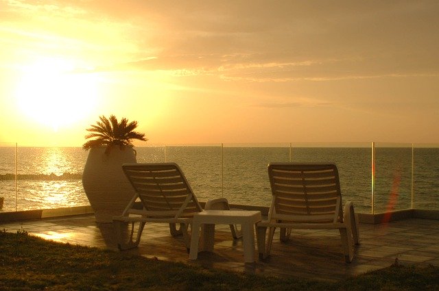 Descărcare gratuită Sunset Sea Calm Deck - fotografie sau imagini gratuite pentru a fi editate cu editorul de imagini online GIMP