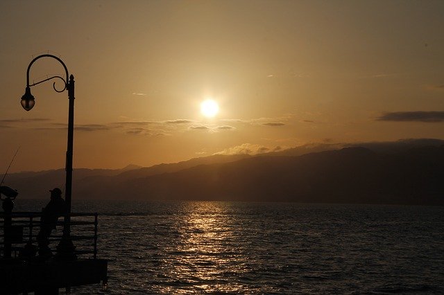 टेम्प्लेट फोटो सूर्यास्त सागर महासागर - OffiDocs . के लिए