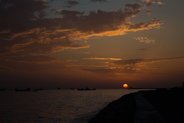 Free download sunset sky clouds view nature sea free picture to be edited with GIMP free online image editor
