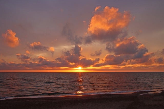 Free download sunset sun clouds sea tuscany free picture to be edited with GIMP free online image editor