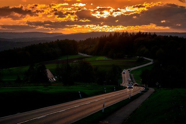 Free download sunset sun dusk clouds road free picture to be edited with GIMP free online image editor