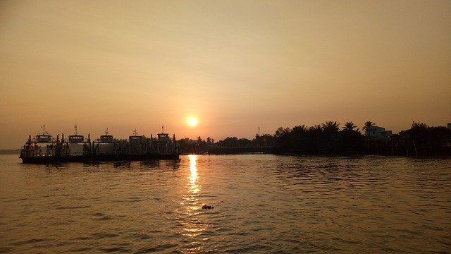 Muat turun percuma Sunset Water The Sea - foto atau gambar percuma untuk diedit dengan editor imej dalam talian GIMP