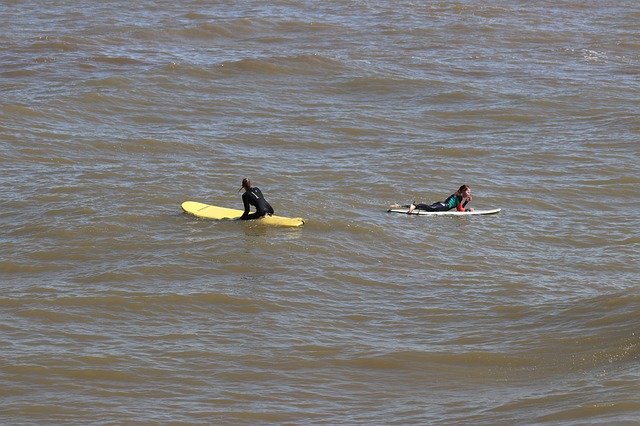 Безкоштовно завантажити Surfers Sea Be - безкоштовне фото або зображення для редагування за допомогою онлайн-редактора зображень GIMP