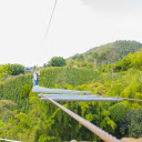 Suspension bridge over green hills  screen for extension Chrome web store in OffiDocs Chromium
