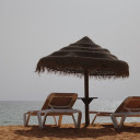 Tasseled umbrella on the beach  screen for extension Chrome web store in OffiDocs Chromium