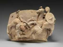 Free download Terracotta relief probably from a funnel vase free photo or picture to be edited with GIMP online image editor