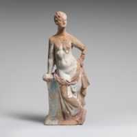 Free download Terracotta statuette of a woman leaning on a pillar free photo or picture to be edited with GIMP online image editor