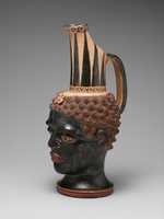 Free download Terracotta vase in the form of a black African youths head free photo or picture to be edited with GIMP online image editor