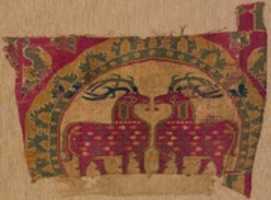 Free download Textile Fragment with Confronted Deer in Partial Pearl Roundel with Serrated Outer Border free photo or picture to be edited with GIMP online image editor