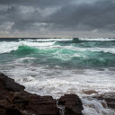 the raging sea with towering waves crashing violently  screen for extension Chrome web store in OffiDocs Chromium