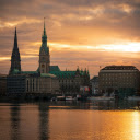 The sun sets over the water and buildings  screen for extension Chrome web store in OffiDocs Chromium