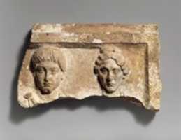 Free download Top of a marble funerary relief with portrait busts of a young man and an elderly woman free photo or picture to be edited with GIMP online image editor