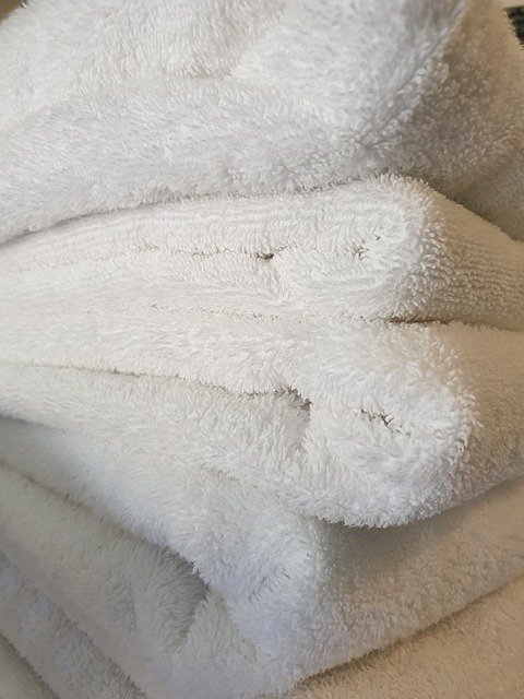 Muat turun percuma Towels Folding Laundry - foto atau gambar percuma untuk diedit dengan editor imej dalam talian GIMP