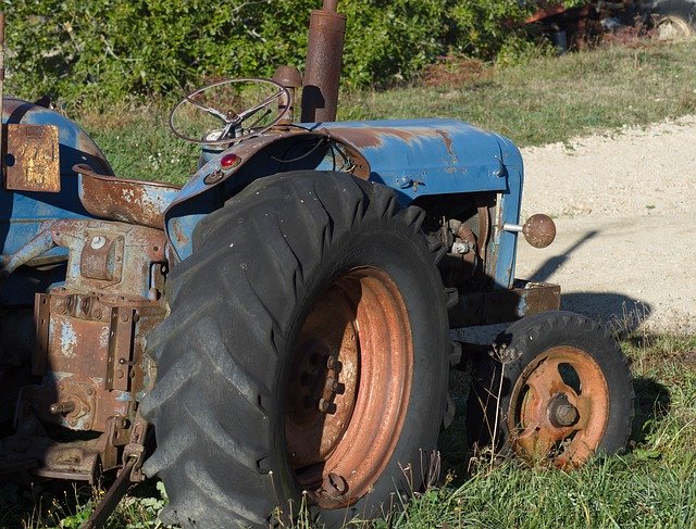 Free download Tractor Wheels Agriculture -  free photo or picture to be edited with GIMP online image editor