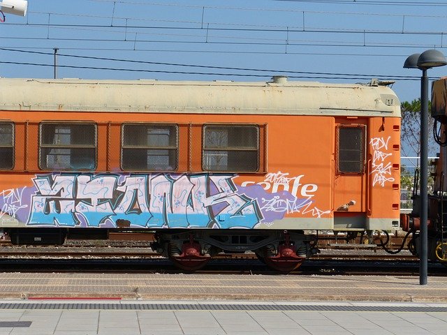 Muat turun percuma Train Wagon Graffiti - foto atau gambar percuma untuk diedit dengan editor imej dalam talian GIMP