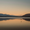 Tranquil Sunset Over Mountain Lake  screen for extension Chrome web store in OffiDocs Chromium