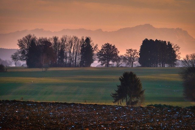 Free download trees fields mountains dusk haze free picture to be edited with GIMP free online image editor