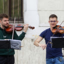 Two gentlemen and music  screen for extension Chrome web store in OffiDocs Chromium