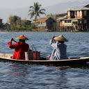 Two people rowing a boat by the river  screen for extension Chrome web store in OffiDocs Chromium